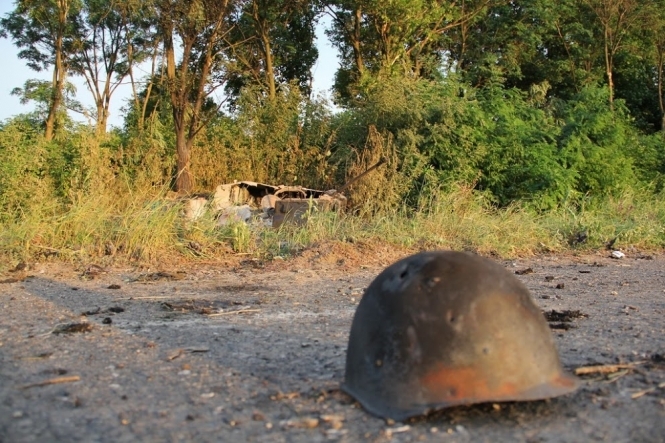Разбитая техника, обгоревшие трупы террористов: как силы АТО зачистили Славянск от боевиков, - фото