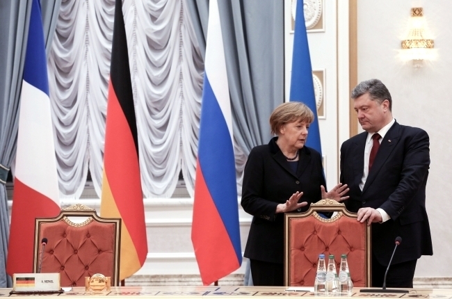 Меркель сомневается в выполнении договора в Минске
