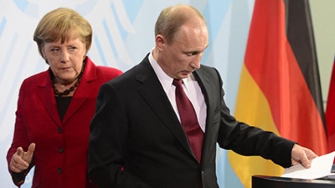 Меркель угрожает Путину санкциями за медленное урегулирование кризиса на Донбассе