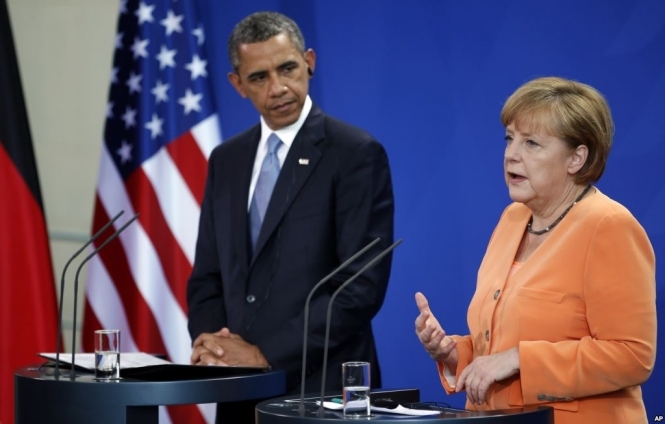 Обама і Меркель домовилися не послаблювати санкції проти Росії