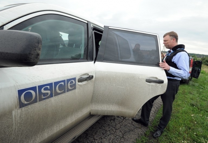 Спостерігачі ОБСЄ зафіксували 10 вантажівок без розпізнавальних знаків поблизу Харцизька