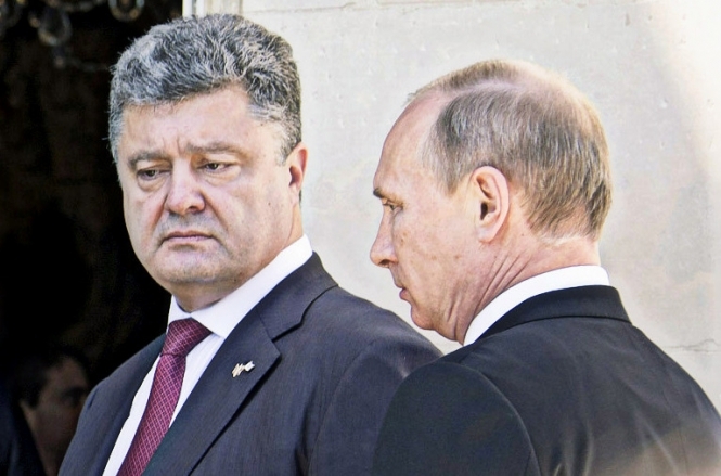 На встрече в Берлине Порошенко накричал на Путина: ты просто перестань стрелять