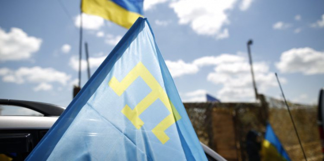 Кримськотатарський прапор - символ нашої боротьби, - Порошенко