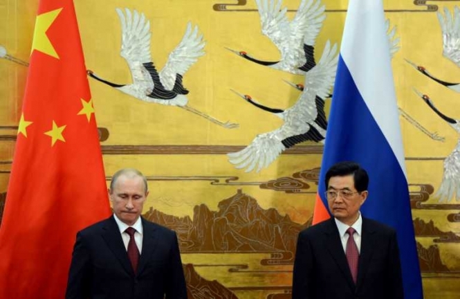 Як саме ліберальним демократіям мати справу з Китаєм і Росією?
