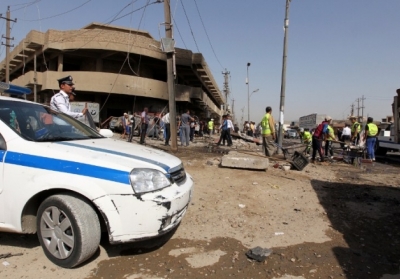 Місце вибуху замінованого автомобіля в центрі Багдада 13 червня 2012. Фото: AFP