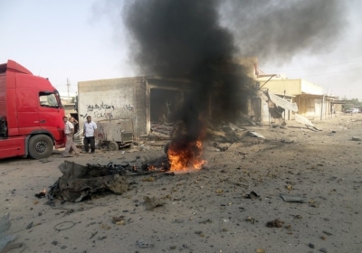 Місце вибуху замінованого автомобіля у північному іракському місті Кіркуку 13 червня 2012. Фото: AFP