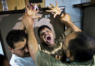 Сектор Газа: батько одного з трьох палестинських дітей убитих в ході боїв між  між Ізраїлем і ХАМАС. Фото: АFР