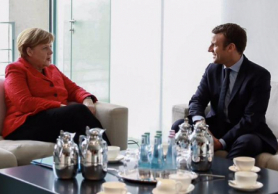 Ангела Меркель і Еммануель Макрон. Фото: twitter.com/emmanuelmacron