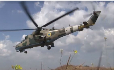Військові провели навчання з бойовими вертольотами в Азовському морі
