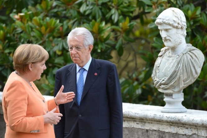 Монті сподівається переконати Меркель підтримати євро