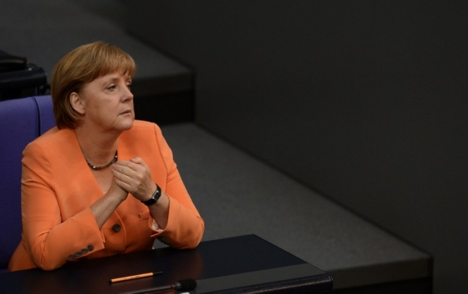 Меркель считает, что в будущем проблема беженцев станет важнее, чем Греция и стабильность евро