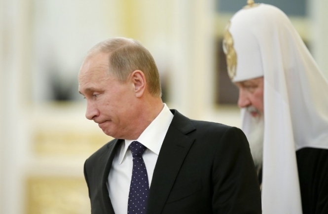Путін розповів, що дитиною його таємно хрестив батько патріарха Кирила