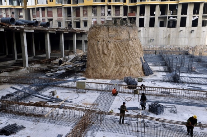 У Китаї будують житловий будинок на цвинтарі – одна могила проти