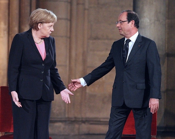 Меркель и Олланд договорились закрепить 