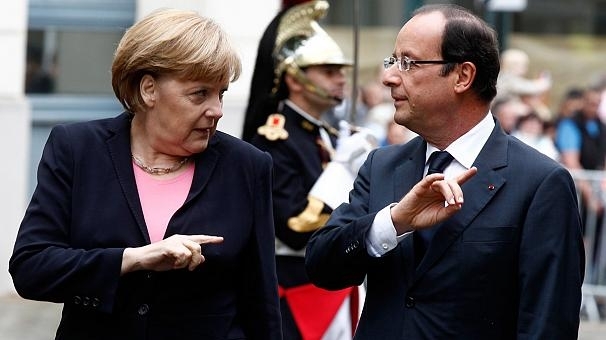 Олланд и Меркель подчеркнули важность продолжения антироссийских санкций