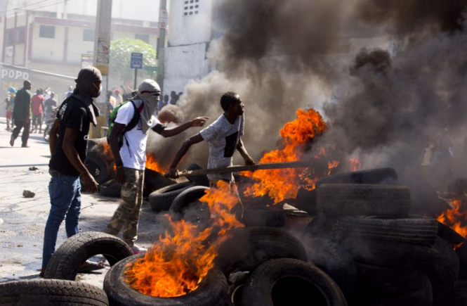 Во время акции протеста на Гаити погибли шесть человек