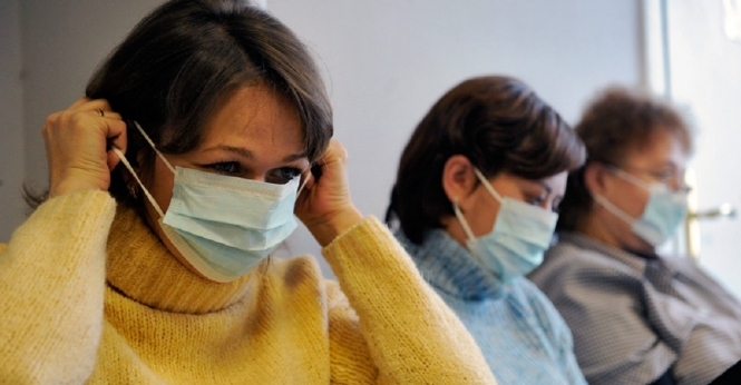 У Києві вводять масковий режим через грип