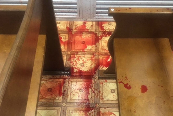У екс-беркутівців під час суду кинули пакет із рідиною схожою на кров