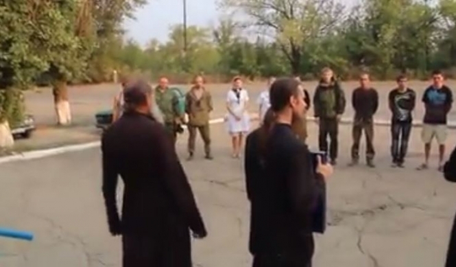 Сященникы благословляют террористов на убийство мирных граждан Украины, - видео