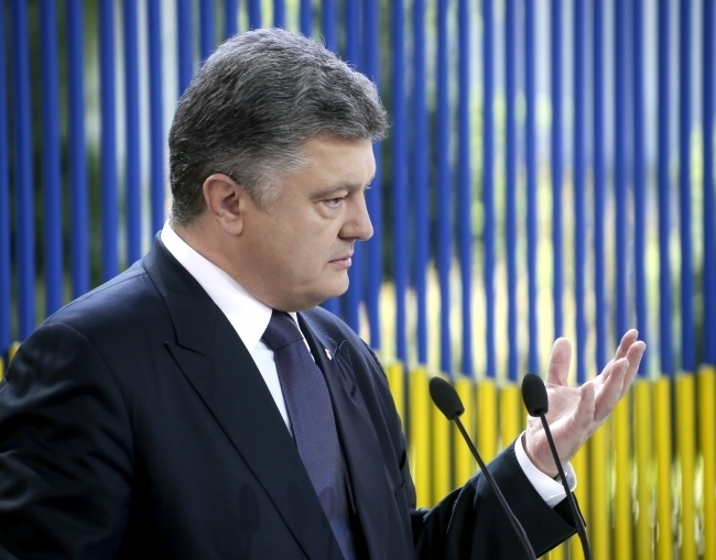 Проведення виборів на Донбасі за присутності іноземних військ неможливі, - Порошенко