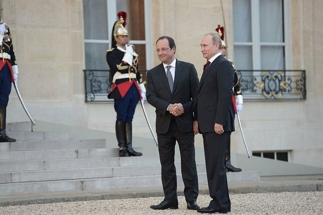 Путин и Олланд общаются за закрытыми дверями перед встречей 