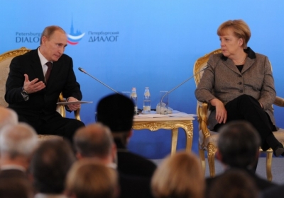 Путин и Меркель предлагают мирные переговоры с террористами в формате видеоконференции
