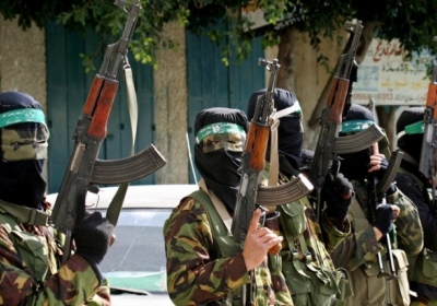 Бойовики з Еззедін аль-Касам, збройного крила головного палестинського ісламістського руху ХАМАС. Фото: AFP