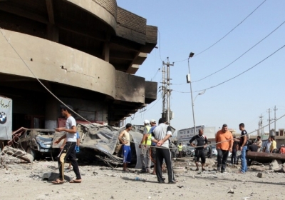 Місце вибуху замінованого автомобіля в центрі Багдада 13 червня 2012. Фото: AFP