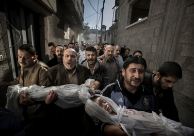 GAZA BURIAL. World Press Photo of the Year. Spot News. Paul Hansen