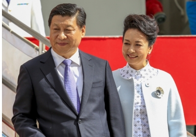 Сі Цзіньпін з дружиною. Фото: EPA