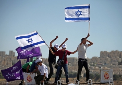 Ізраїльскі поселенці протестують проти преселення. Фото: ЕРА
