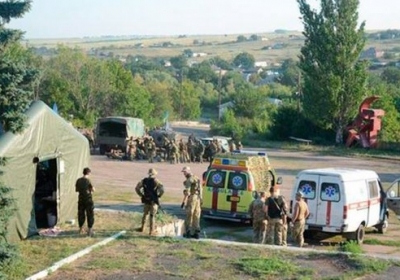 Украинские бойцы после бою за Старогнатовку