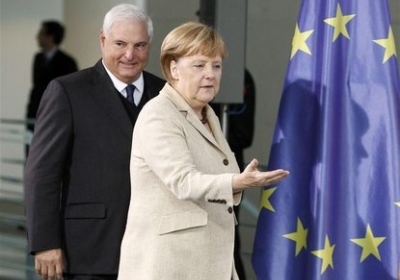 Ангела Меркель та Рікардо Мартінеллі. Фото: whtc.com