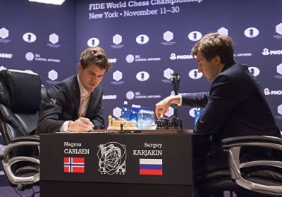 Магнус Карлсен проти Сергія Карякіна. Фото: РИА Новости. Ненсі Сісель